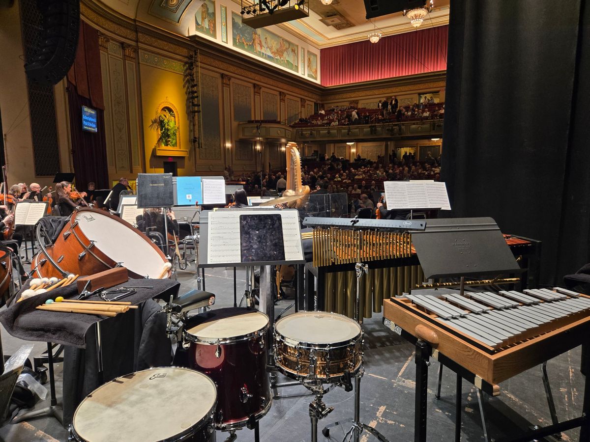 A full house at the York Symphony, seen from behind the percussion section